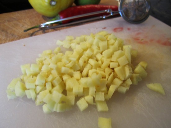 Cut the ginger julienne (into thin strips) and then brunoise (into tiny cubes). You can also grate the ginger.