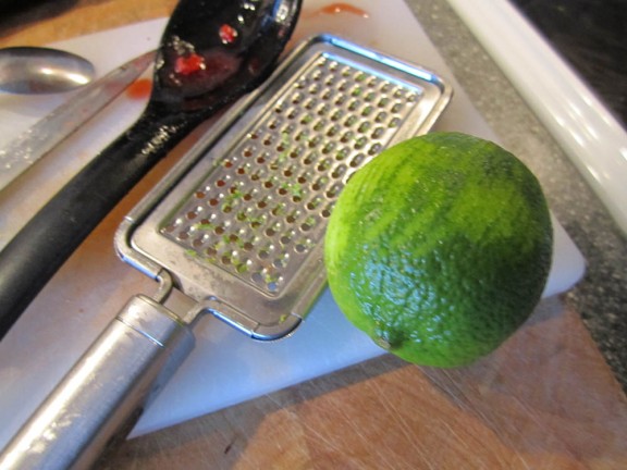 Grate the lemon and lime skin. Add this to the berry mixture after you've boiled the berries & spices.