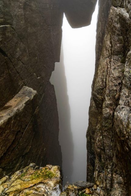 Kjeragbolten is suspended above a 984-metre deep abyss.